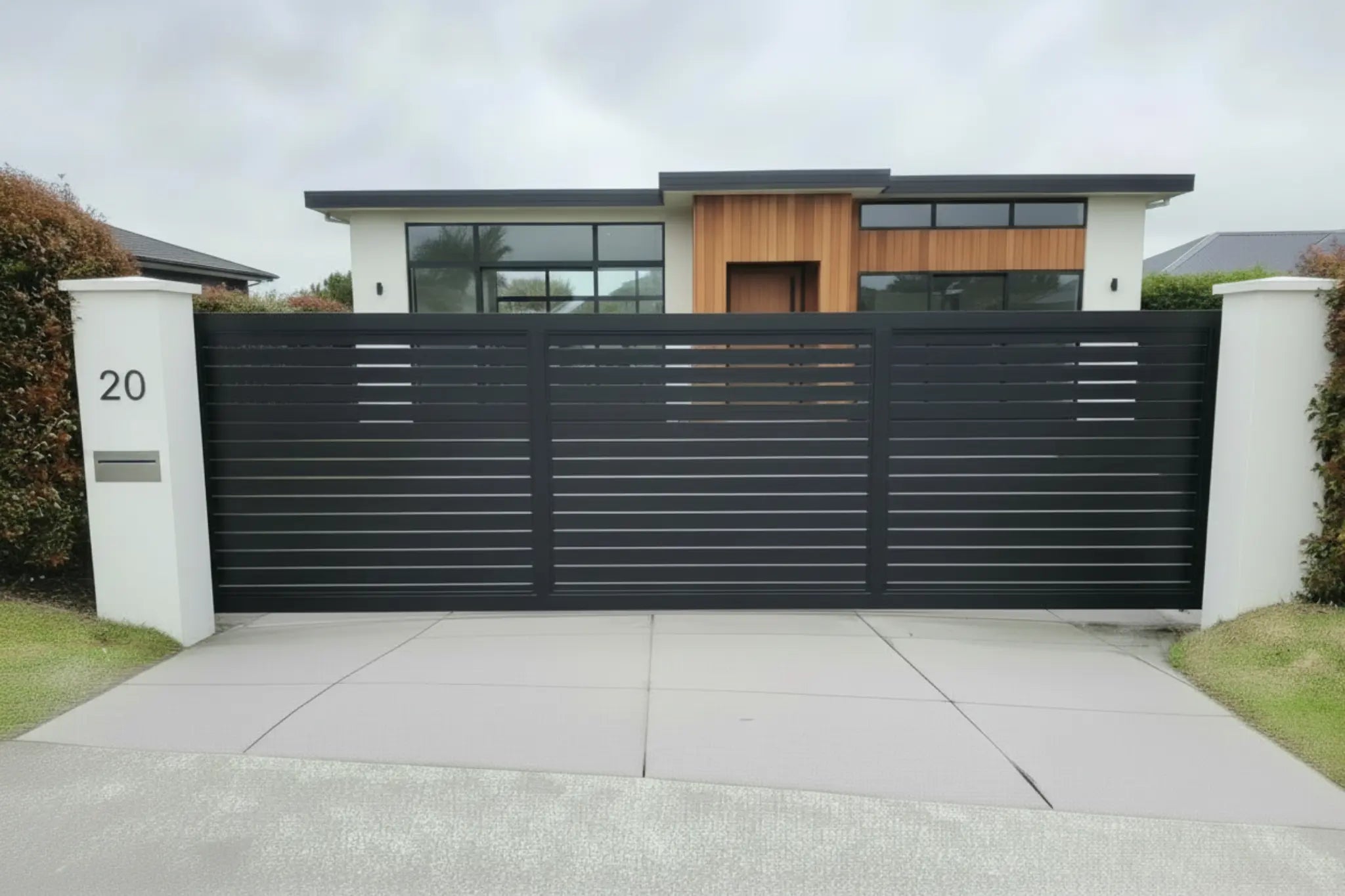Horizontal slat sliding gate in black 5915mm installed - XGATE NZ