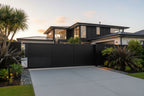 Vertical louvre sliding gate in black 5015mm installed - XGATE NZ