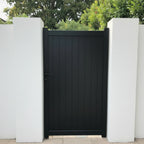 Vertical Tongue and Groove Aluminium Pedestrian Gate Black installed between white walls - XGATE NZ